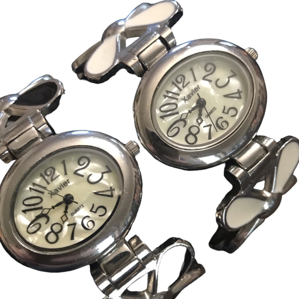 TWO Matching Ladies Stainless Xavier Hinged Watches. 1 Black and 1 White
